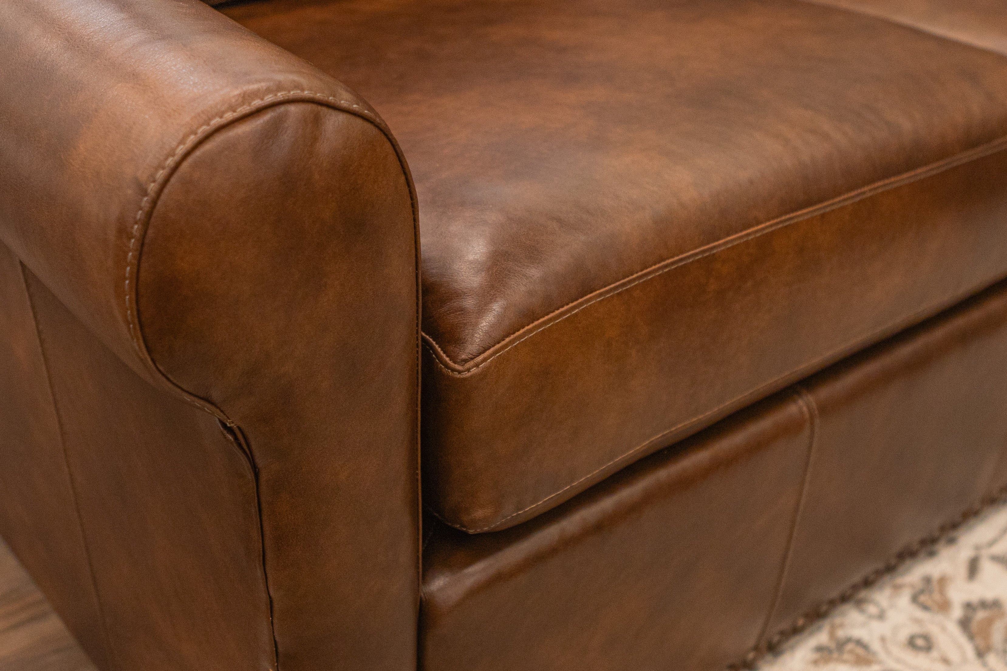 Roark 64" Rolled Arm 3 Cushion Top Grain Leather Loveseat - Tombstone Antique