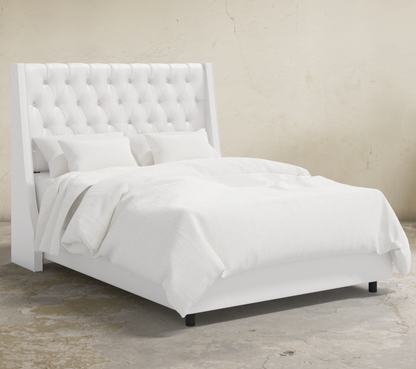 Londyn Tufted Customizable Wingback Bed