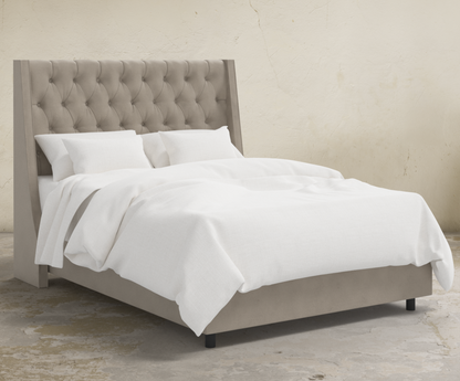 Londyn Tufted Customizable Wingback Bed