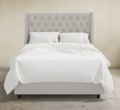 Londyn Tufted Customizable Wingback Bed